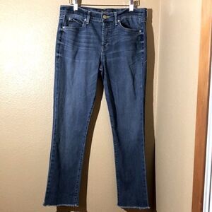 Anthropologie Level 99 button fly, 5-pocket style jeans with raw edge hem.